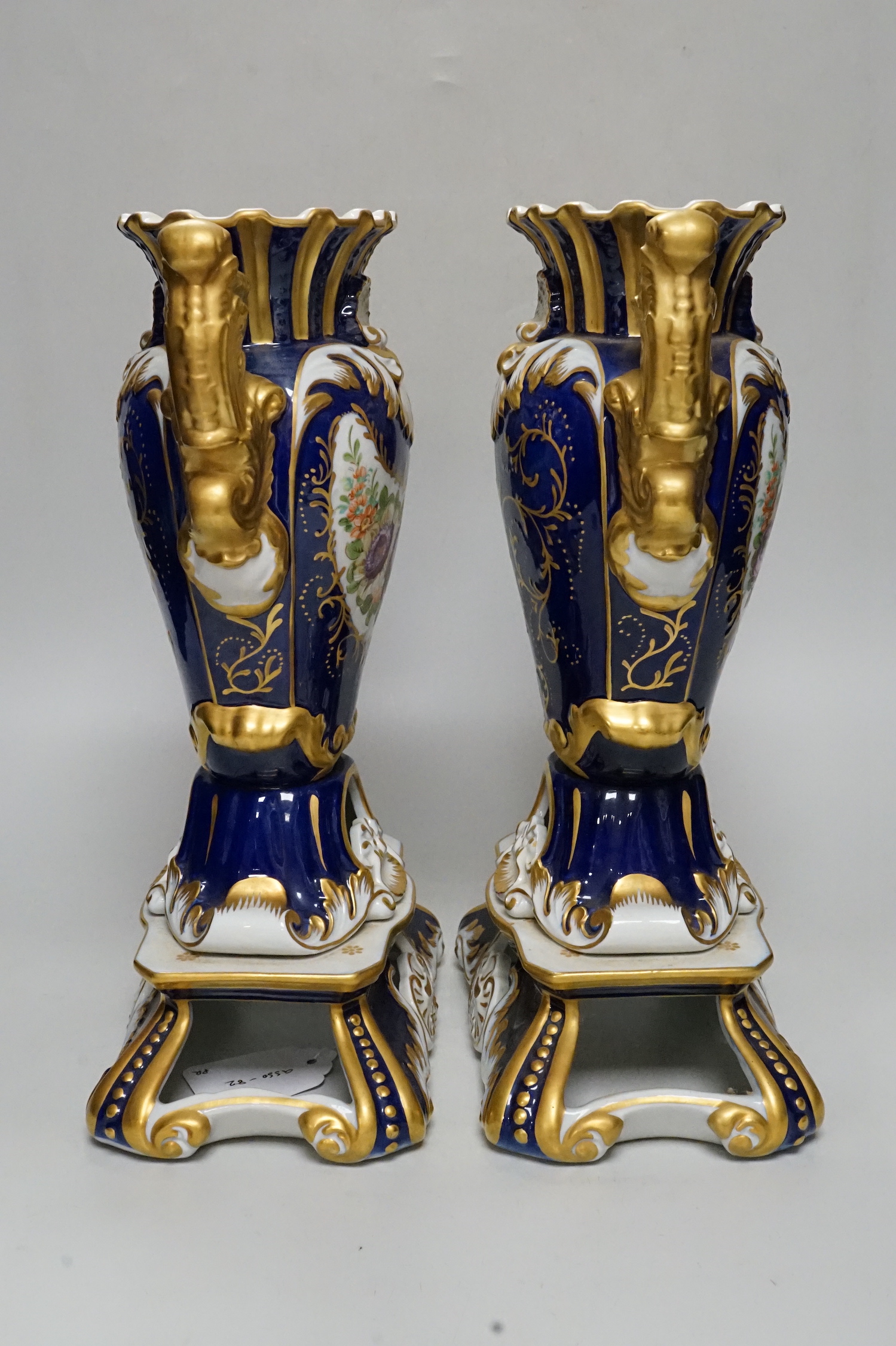 A pair of Sevres style porcelain vases, 31.5cm